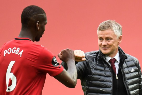 Ole Gunnar Solskjaer greets Paul Pogba after a game 